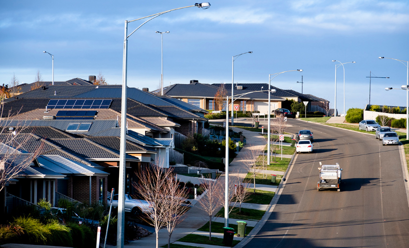 Street with houses with solar panels installed